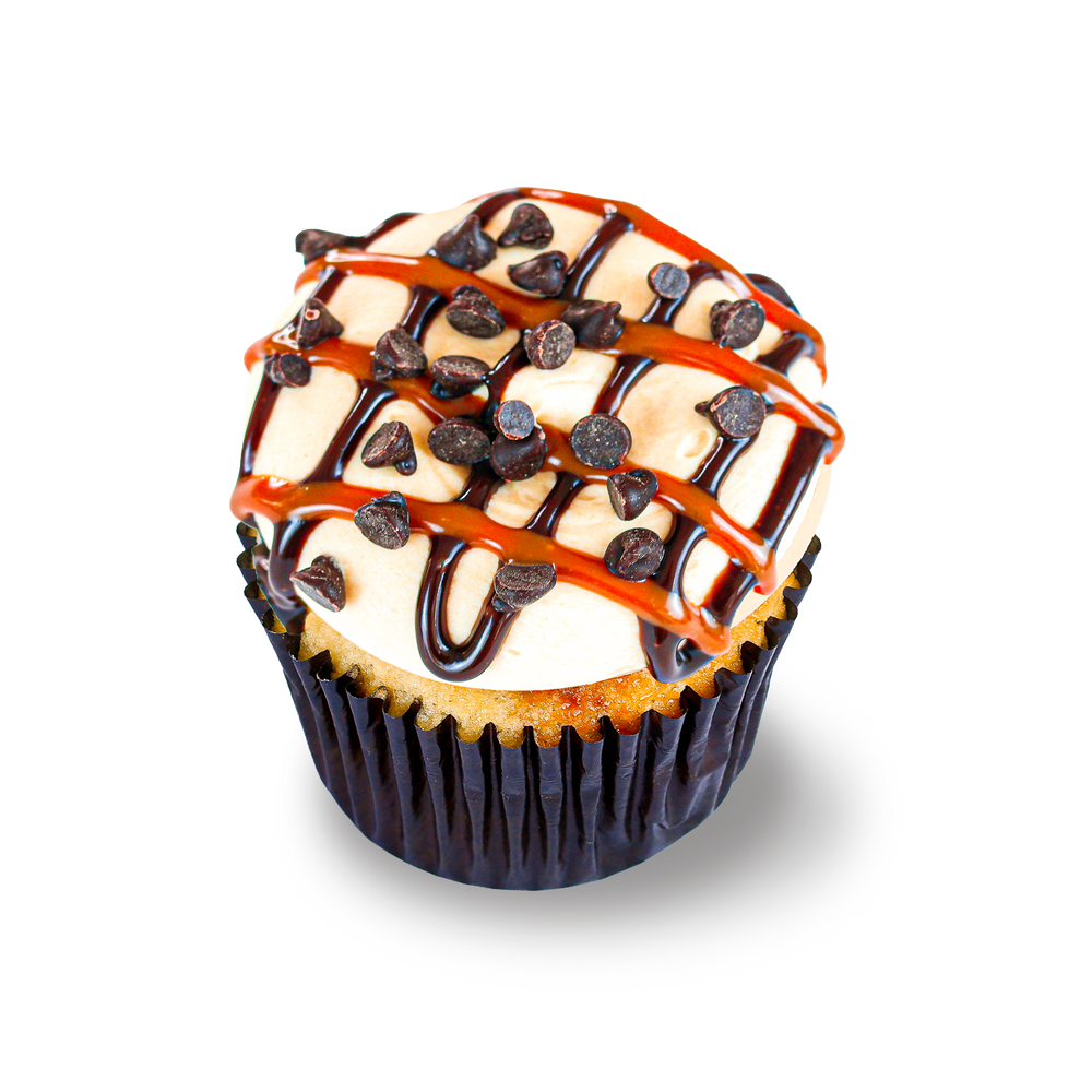 Caramel cupcake with chocolate drizzle and chips